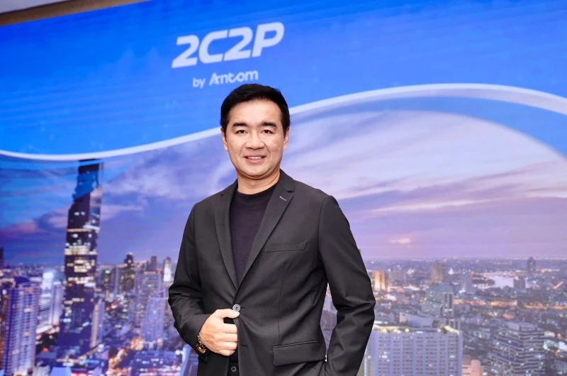 On stage under the new 2C2P by Antom logo at the 2C2P NEXT press conference