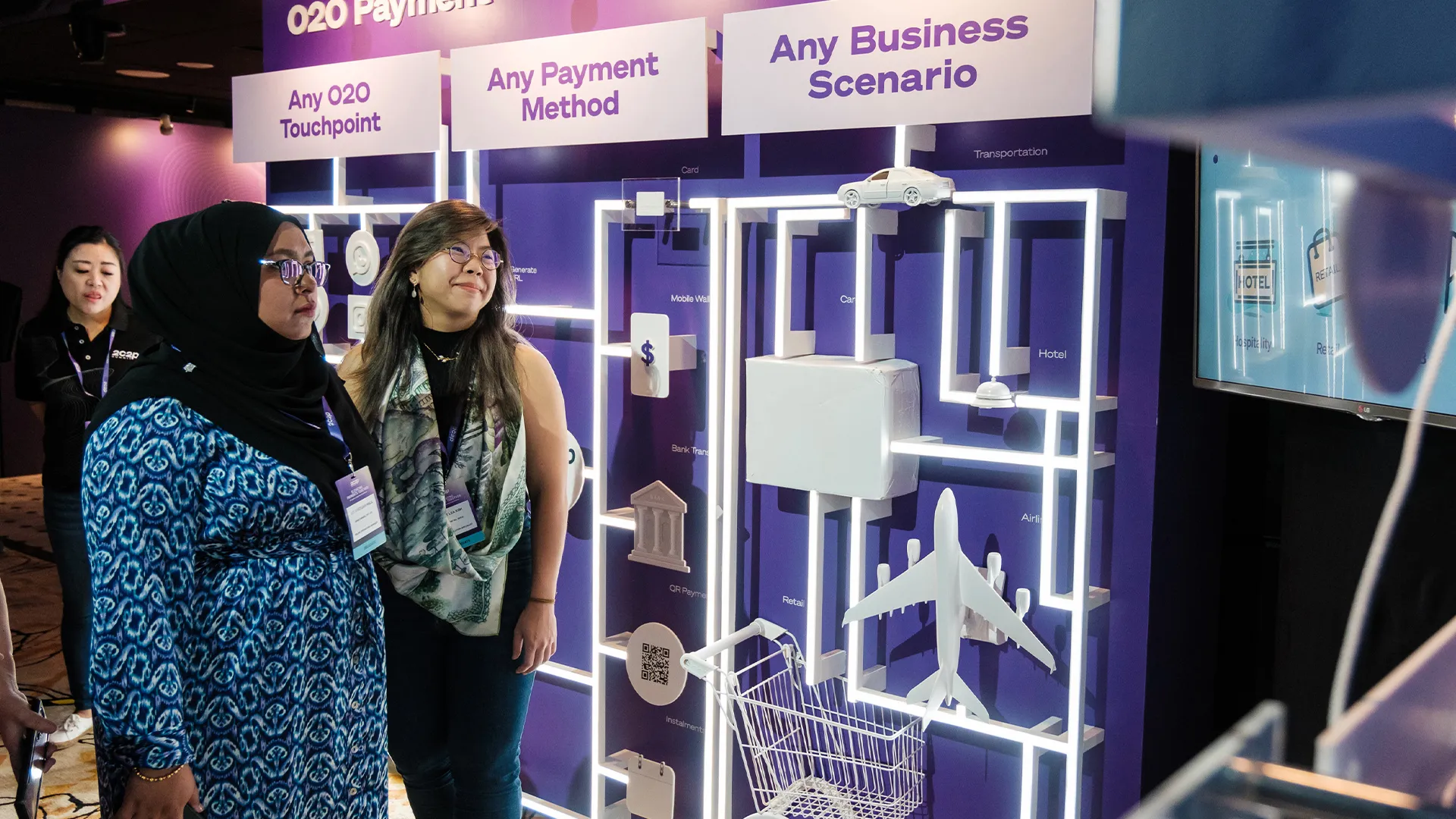 Guests at the payment scenario wall