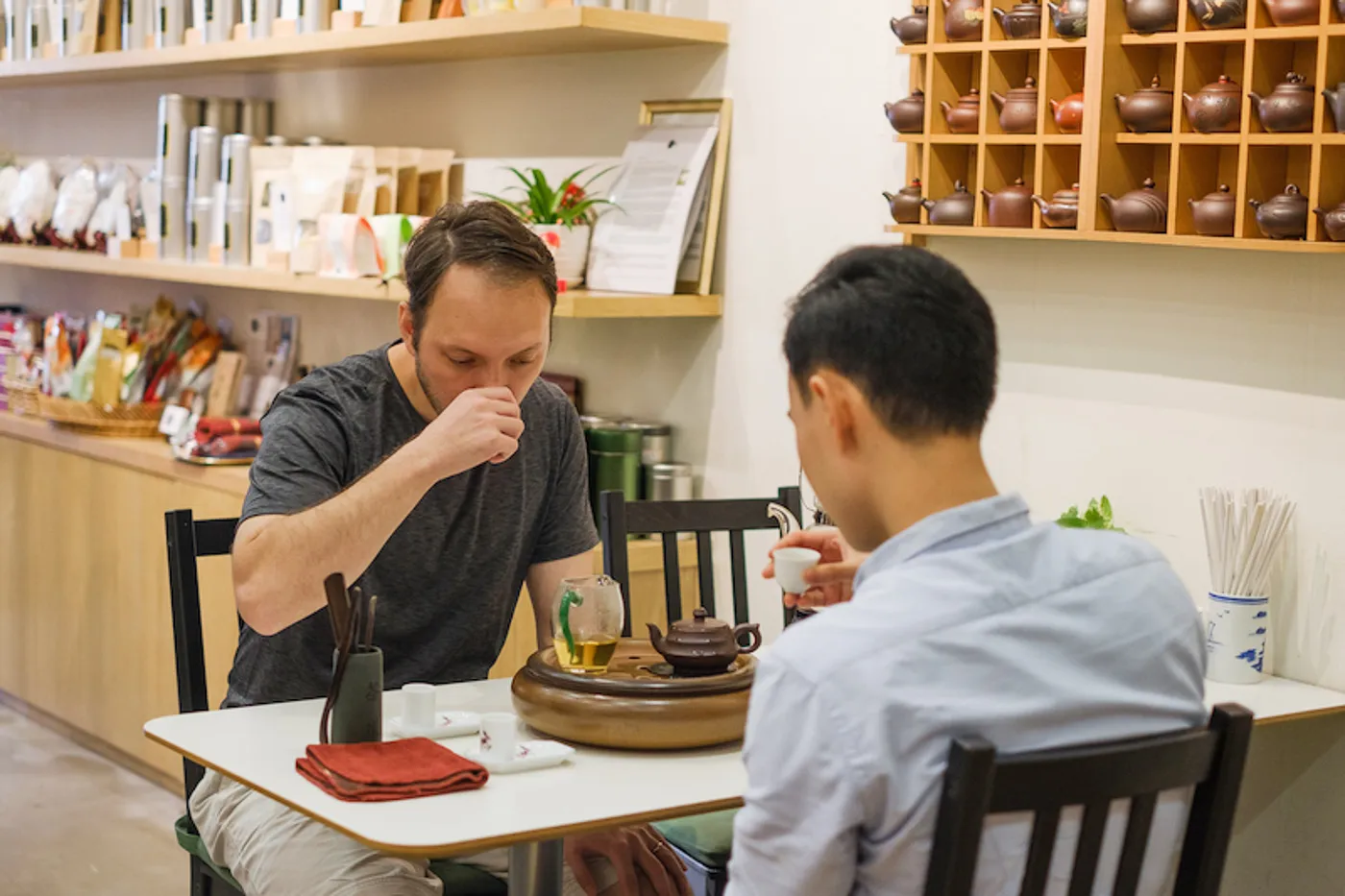 Guests drinking tea inside the shop