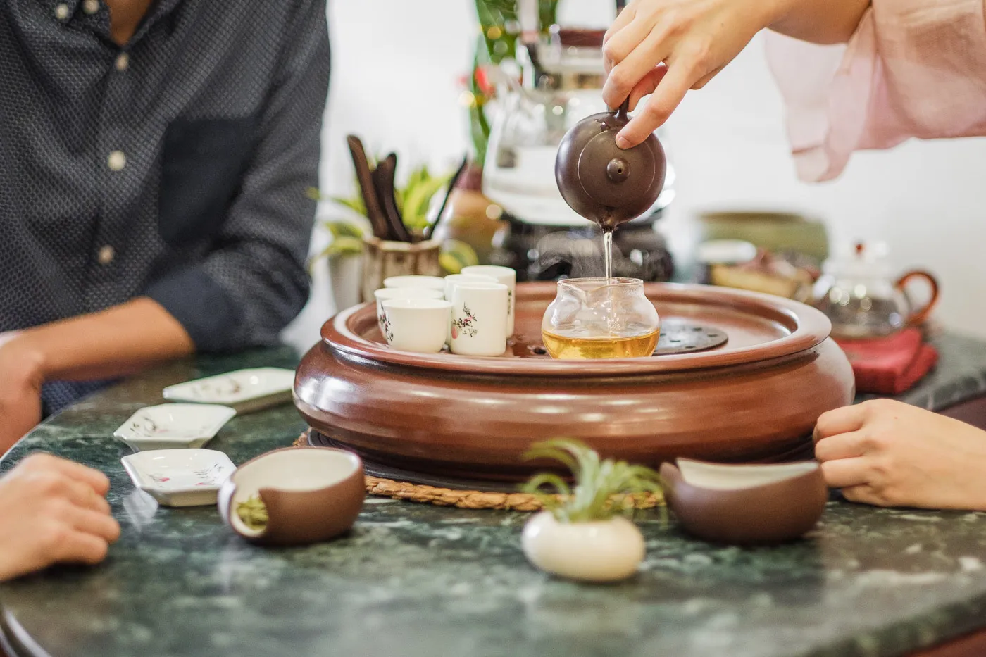 Pouring tea at the tea table