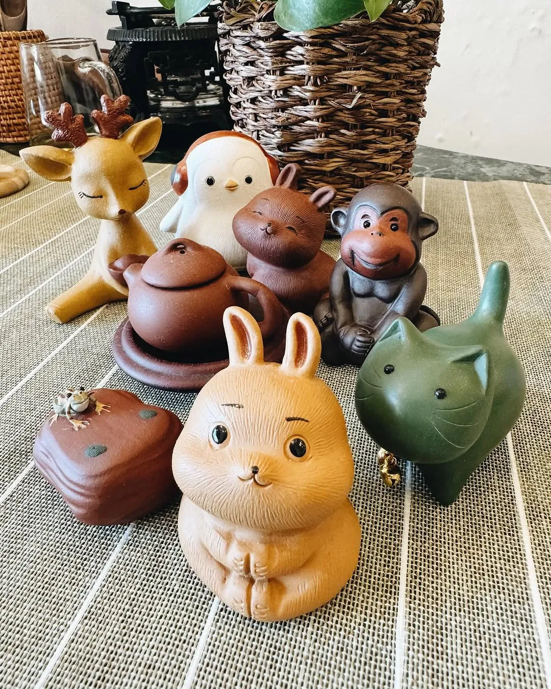 Teaware and tea pets on the shelf